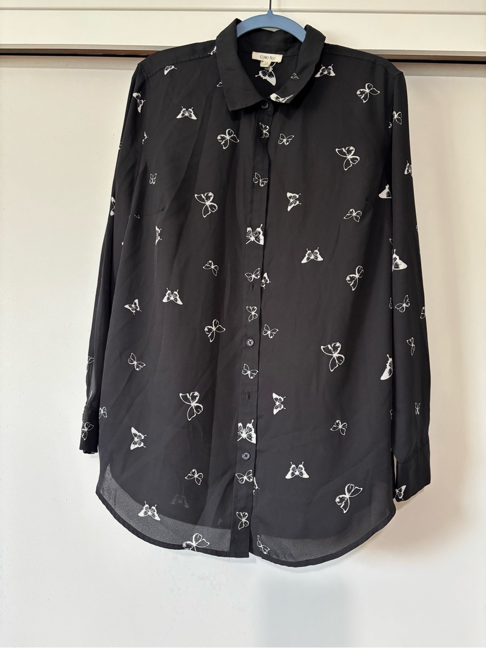 Long-Sleeve Black Blouse with White Bow Motif